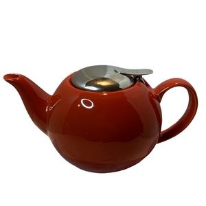 Orange ceramic teapot